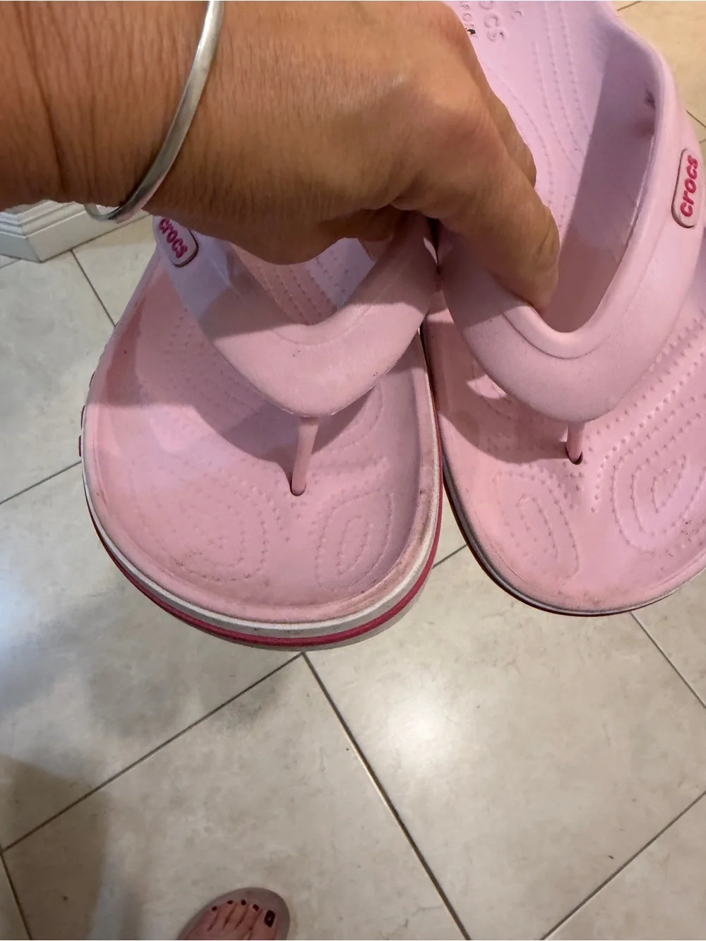 CROCS women’s Light Pink flip flops
